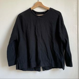 Black Crane open-back top in excellent condition